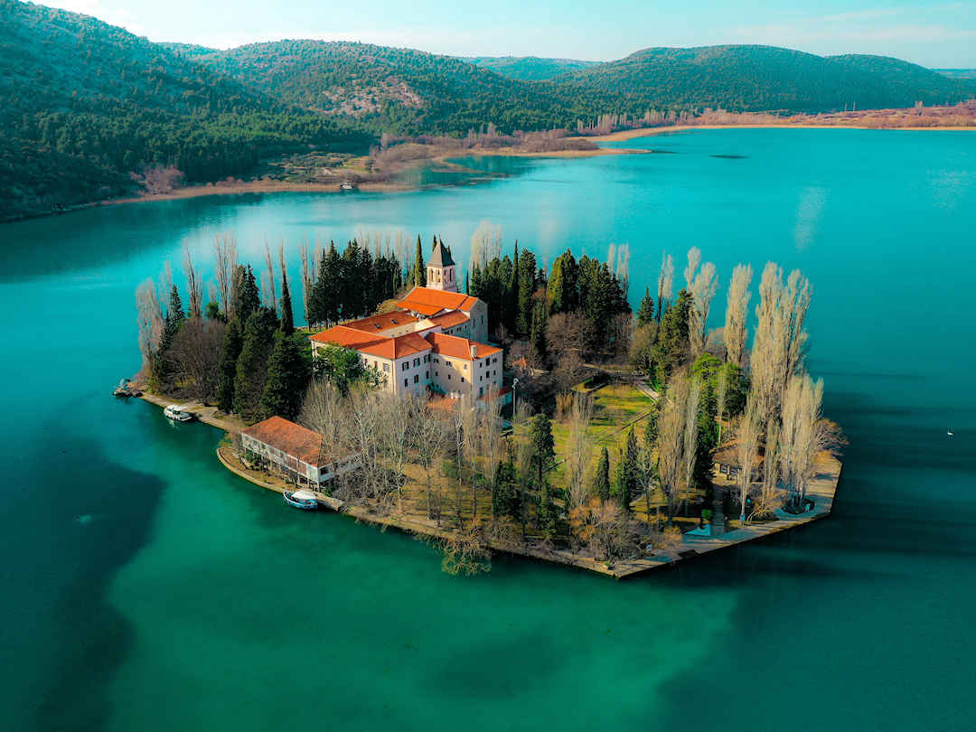Krka Aerial view of Visovac Monastery by Hrvoje Klaricon Unsplash Krka has plenty to keep you busy for days, including tranquil monasteries like this | Image courtesy of Hrvoje Klaricon on Unsplash