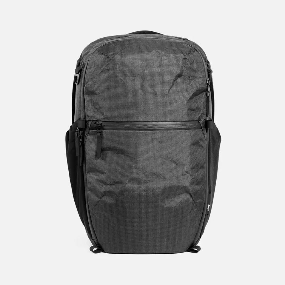 Gray minimalist backpack with front zipper pocket