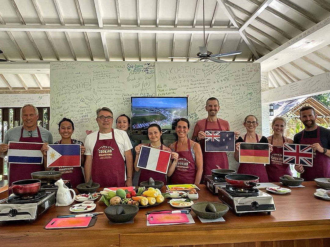 cooking class participants with flags
