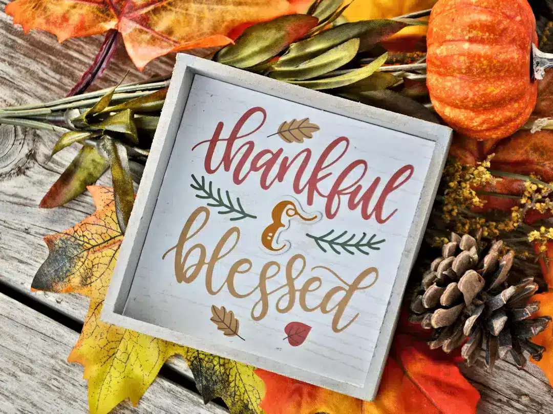 Thankful and blessed sign with autumn decorations.
