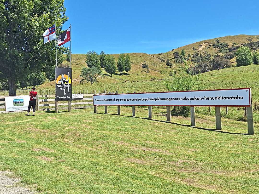 Long place name sign in New Zealand countryside