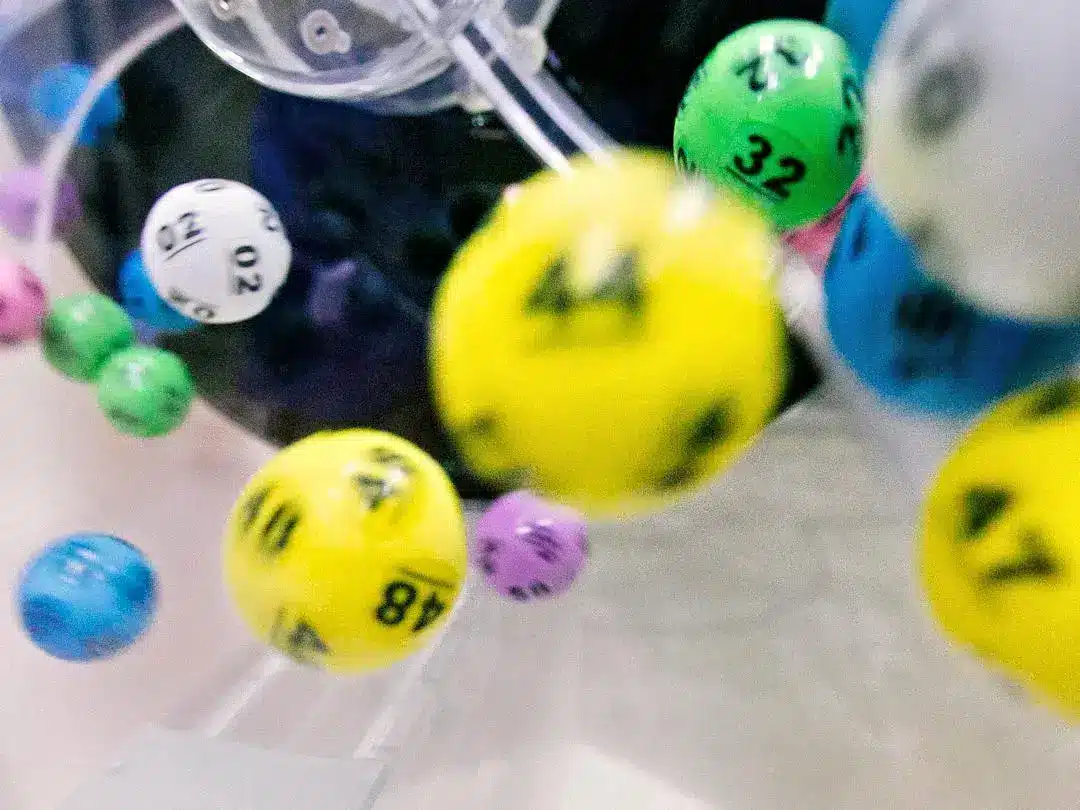 Lottery balls in motion drawing numbers