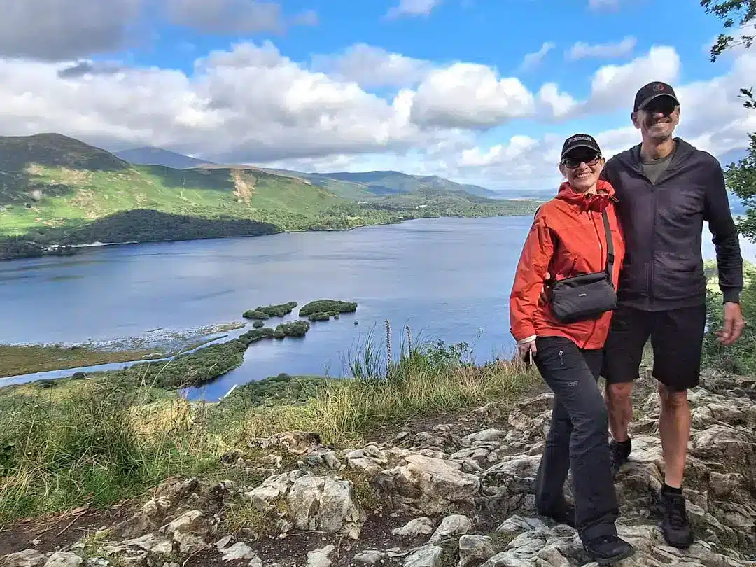 Paul and Sandra at a scenic viewpoint overlooking Derwentwater in the Lake District