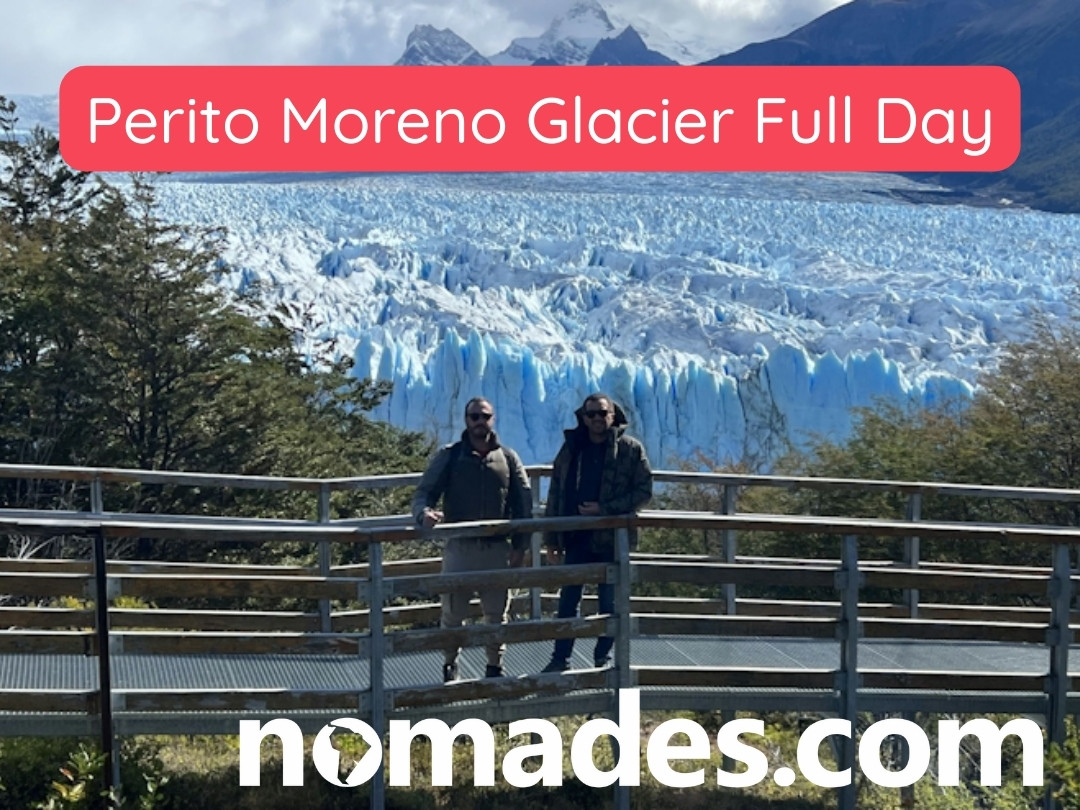 Travellers standing on a viewing platform overlooking the Perito Moreno Glacier in Los Glaciares National Park