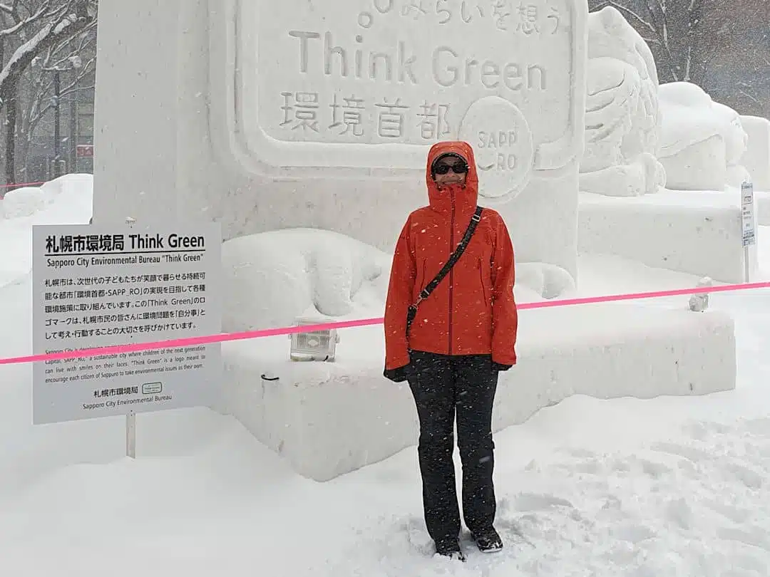 Sandra standing in front of ice sculpture in Sapporo