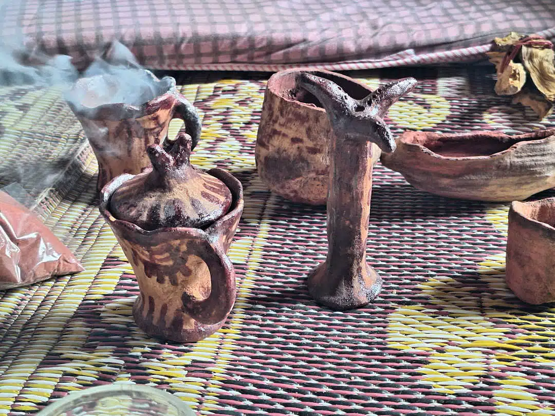 socotri souvenirs from firmhin village Ceramic smoking incense burners on woven mat