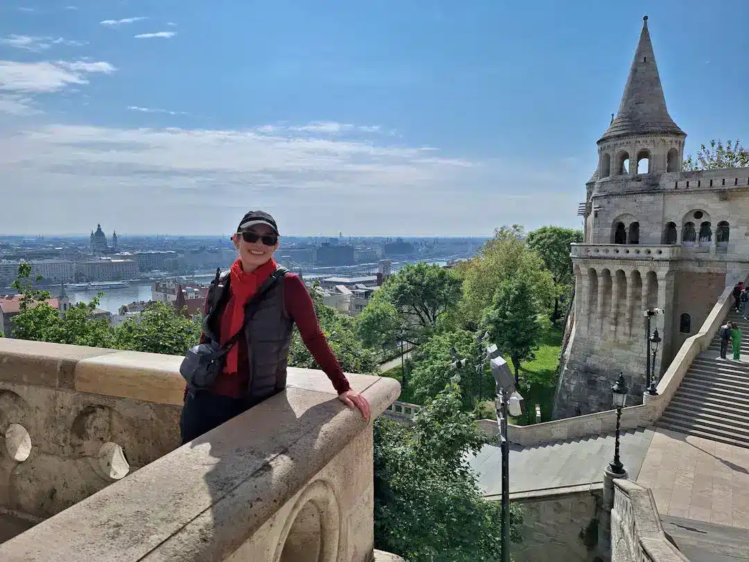 Views from Fishermans Bastion Budapest Person at Fisherman's Bastion, Budapest, overlooking cityscape.