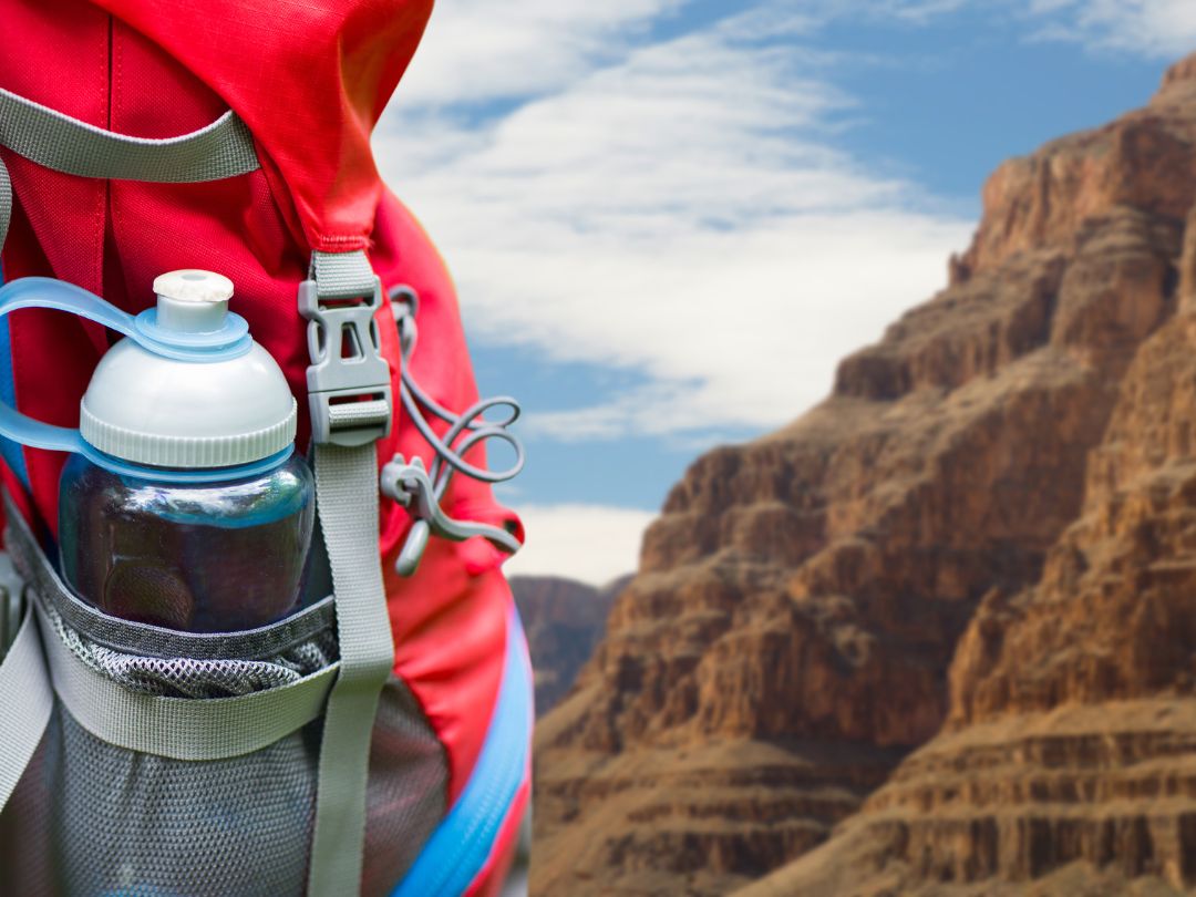 Water bottle in red backpack